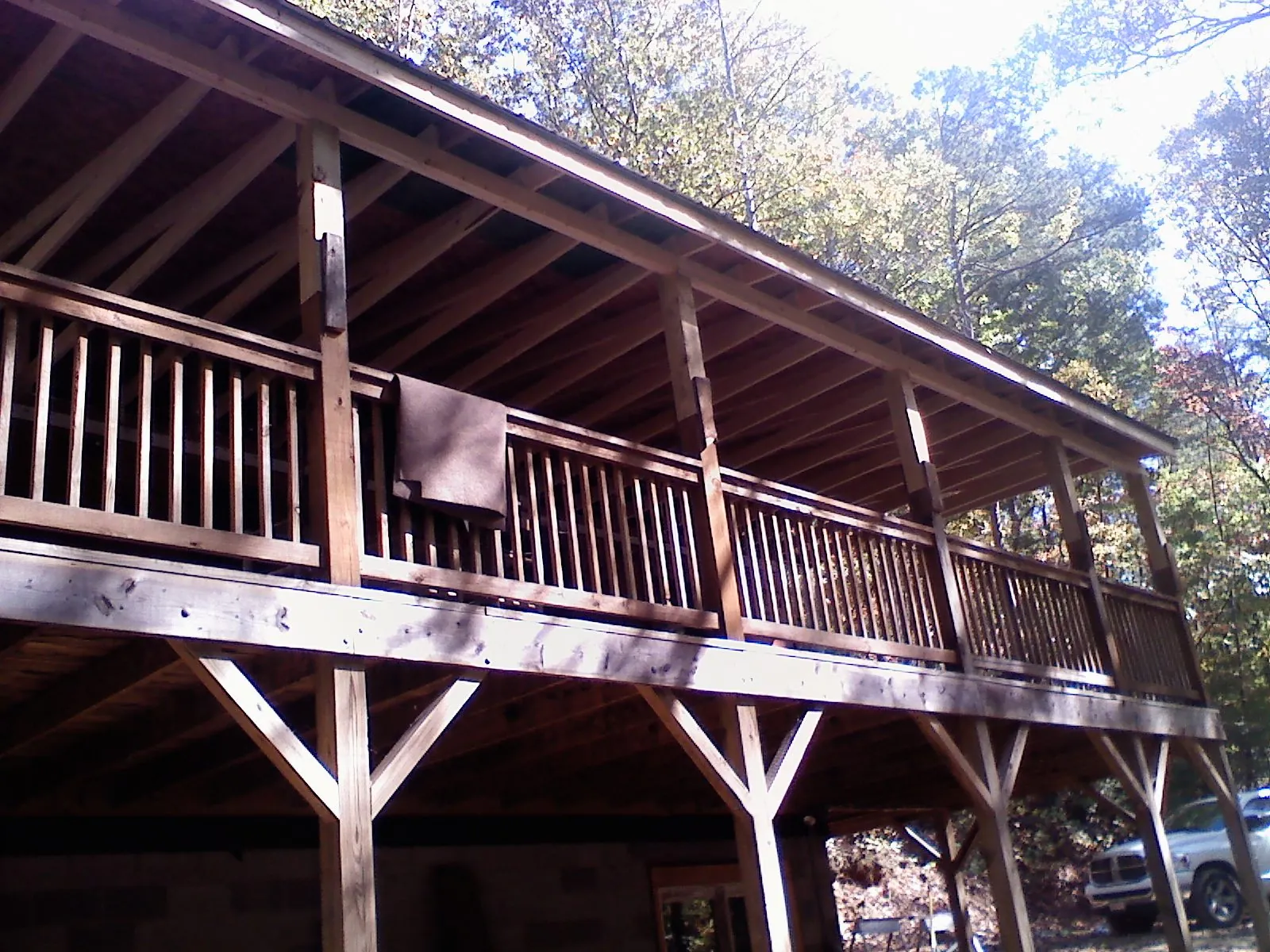 Timber framing under a new elevated porch and deck — Roof Leak Repair in Westhampton Beach by Roofing Brothers